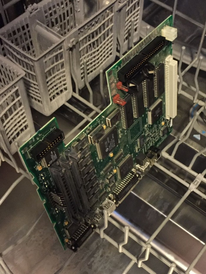 Macintosh LC II/Performa 410 logic board ready for a cleaning.